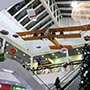 Украшения интерьера - спускающиеся на парашютах Санта Клаус и подарки на фоне макета самолёта «Илья Муромец». Торгово-развлекательный центр «Аэромолл», г.Борисполь Украшения интерьера - спускающиеся на парашютах Санта Клаус и подарки на фоне макета самолёта «Илья Муромец». Торгово-развлекательный центр «Аэромолл», г.Борисполь